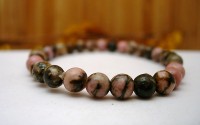 Bracelet en Rhodonite 6mm.