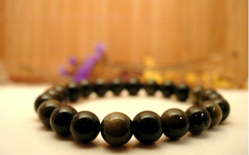 Bracelet en Obsidienne dorée. 