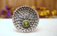 Bague en argent et Péridot T 54