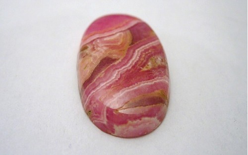Pierre polie Rhodocrosite en cabochons. Pierre polie Rhodocrosite en cabochons.