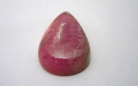 Pierre polie Rhodocrosite en cabochon.